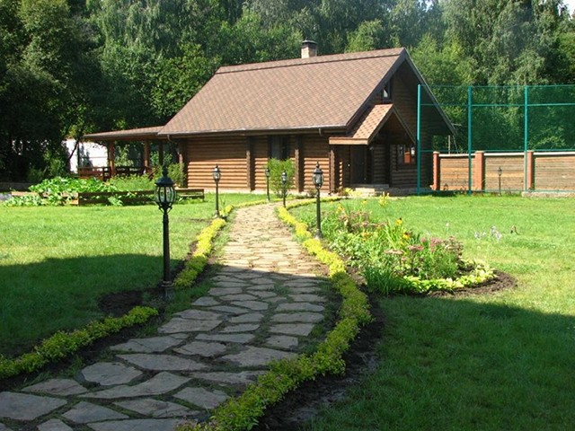 загородный дом из оцилиндрованного бревна 